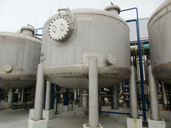 Concrete water tanks outside of an industrial building